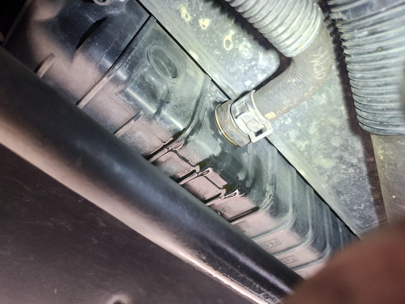 Mobile mechanic diagnosing an overheating engine in Pittsburgh